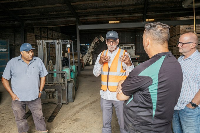 Mayor Wayne Brown, with Franklin councillor Andy Baker (right) talks to Growers’ Association representatives at Pukekohe. Image © Our Auckland.