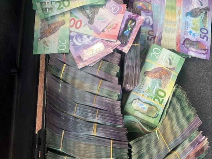 Police seize guns, meth, $300k cash and pipe bomb materials in major ...