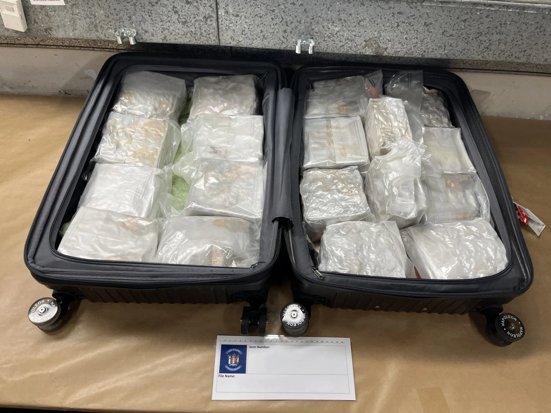 Woman charged for importing 18kg of meth at Auckland Airport