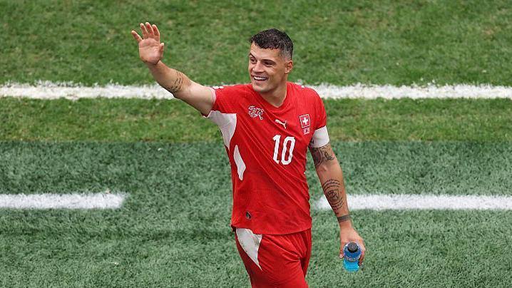 Swiss football captain admits using fake Covid certificate over vaccine ‘mistrust’ 1 images 1 2